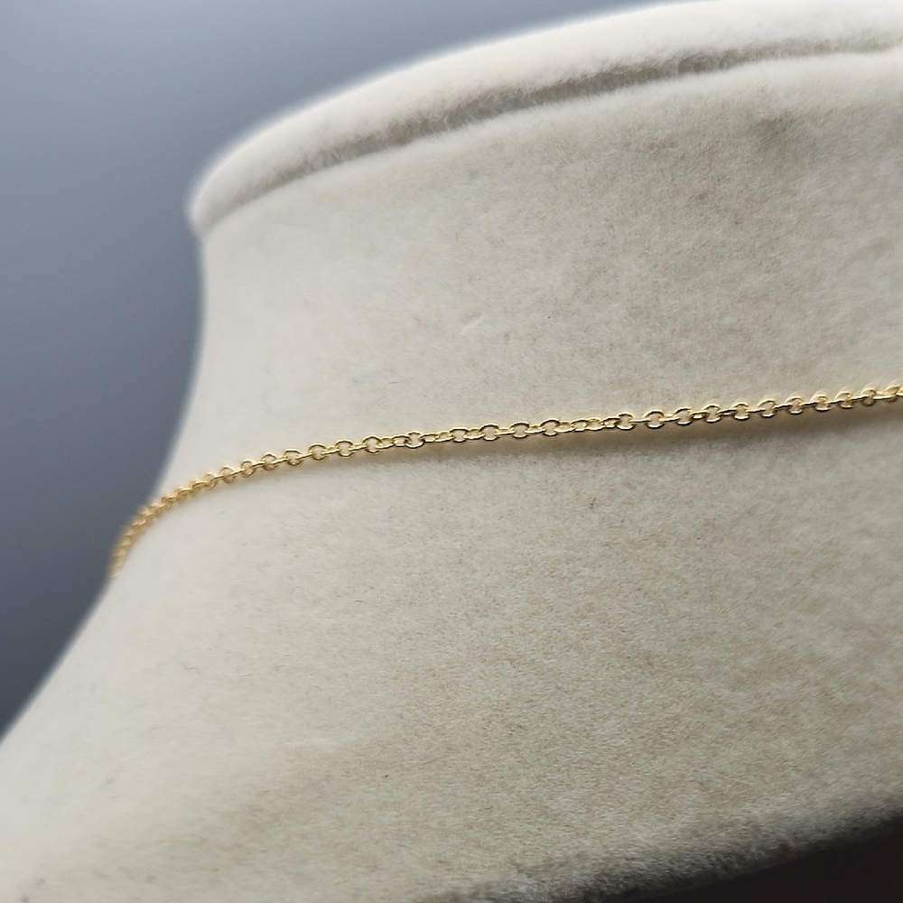 Tory Burch Black and Gold Emblem Necklace - Picture 8 of 9